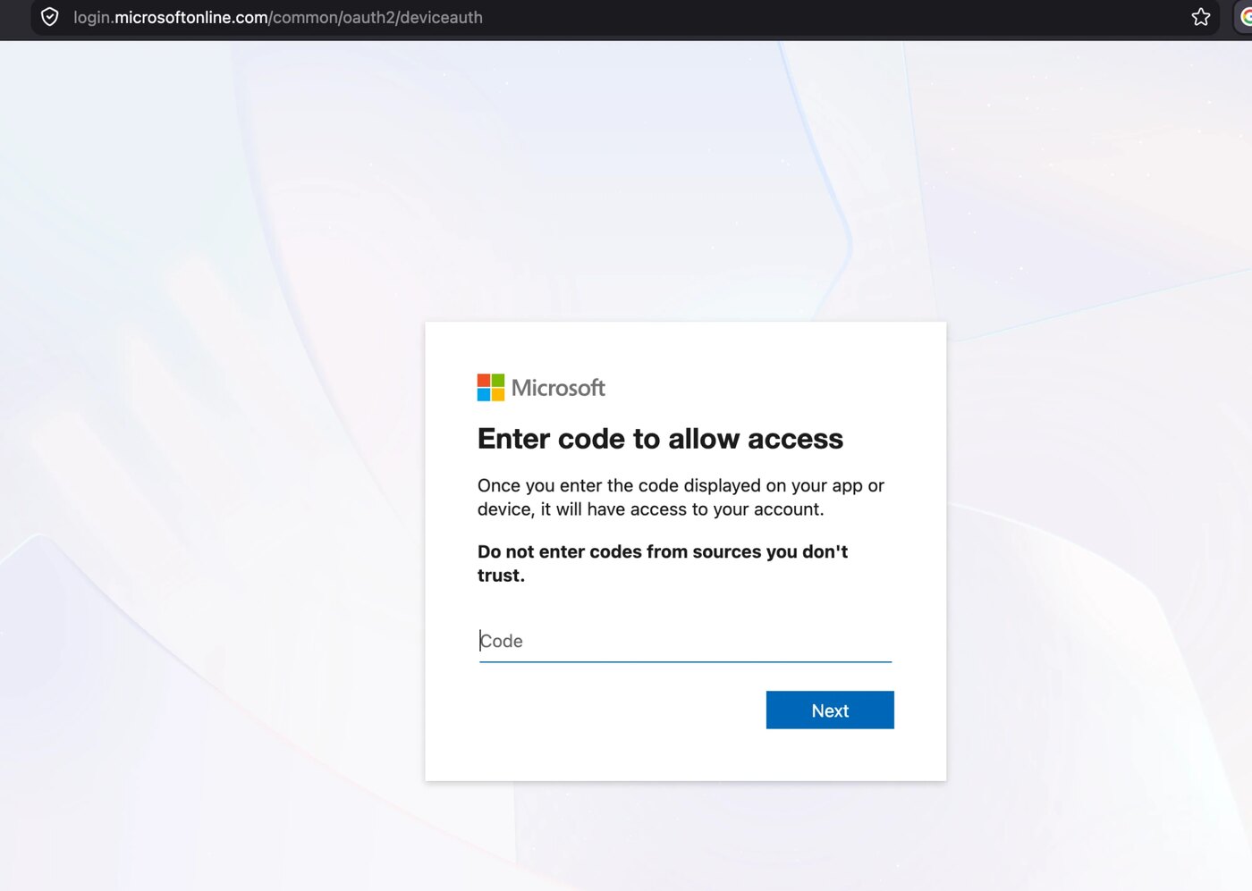 The genuine Microsoft page at login.microsoftonline.com slash common slash oauth2 slash deviceauth, headed Enter code to allow access, with a bold warning reading Do not enter codes from sources you do not trust, a Code field and a Next button.